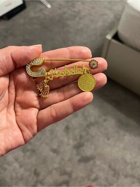 Gold color ‘Mashallah' Safety Pin baby accessory  with Pink Crystal Accents